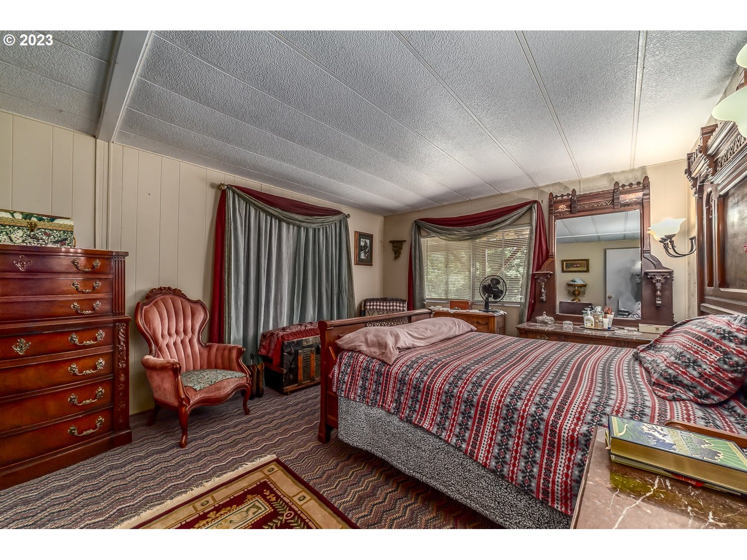 40277 Reuben Leigh Road Lowell, OR 97452 - Photo 29 of 46 a bed room with a bed and a chair