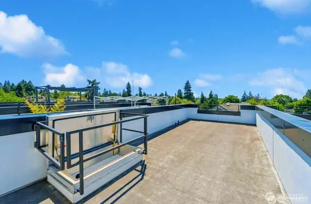 a view of a terrace with sitting area
