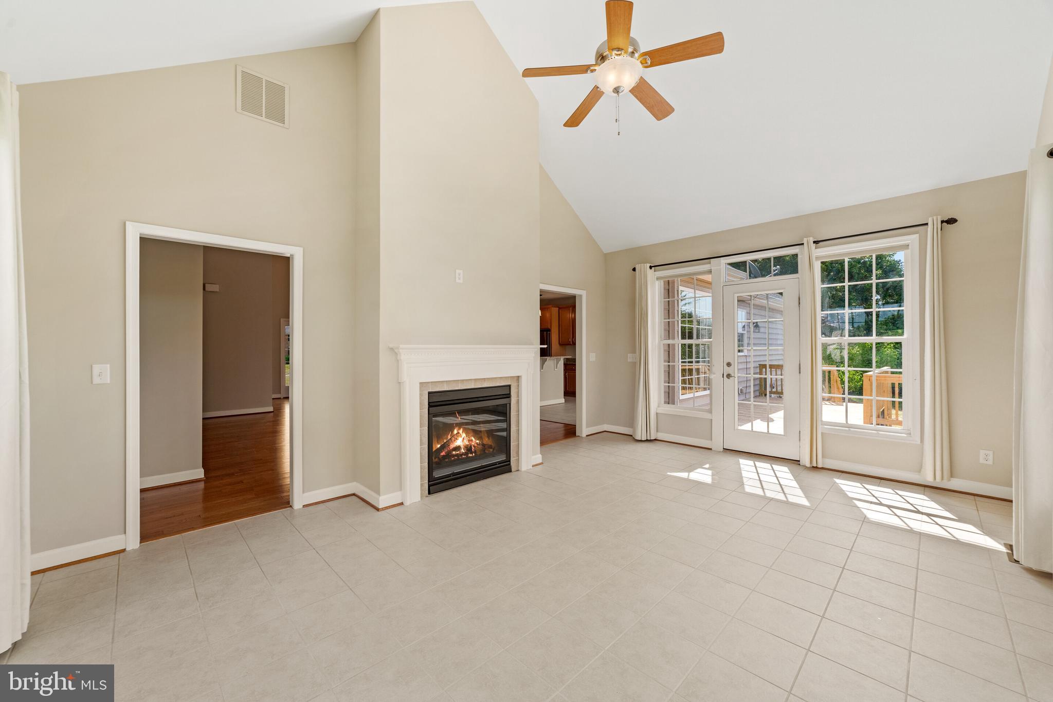 19198 Stallion Road Culpeper, VA 22701 - Photo 14 of 43 sun room with see thru fireplace