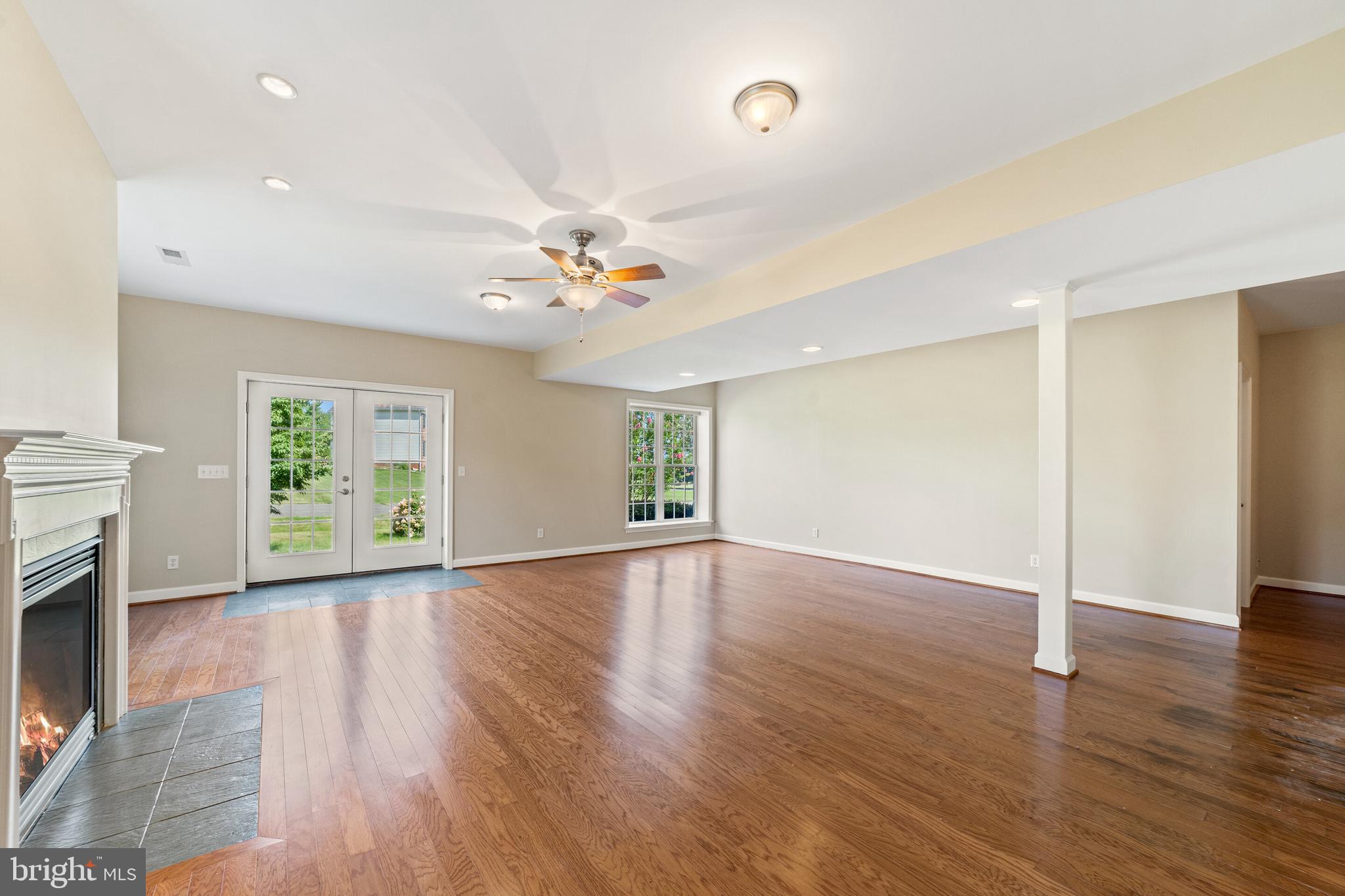 19198 Stallion Road Culpeper, VA 22701 - Photo 20 of 43 lower level rec room with fireplace