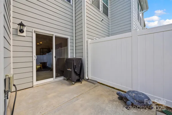 a view of a front door and bedroom