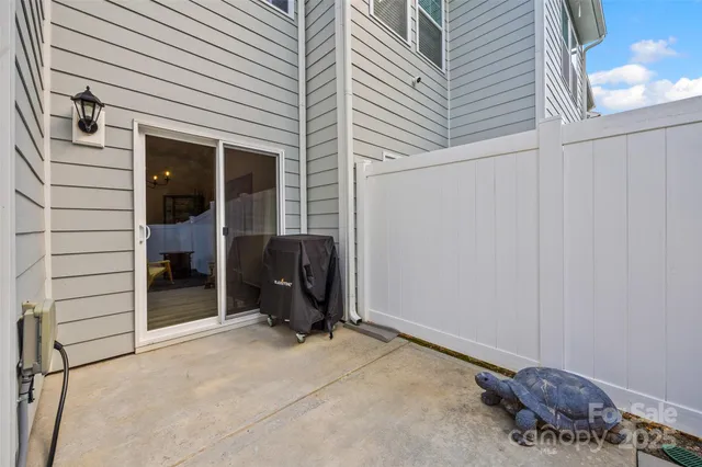 a view of a front door and bedroom