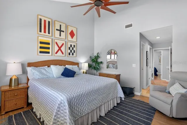 a bedroom with bed and a couch