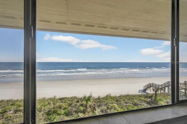 a view of ocean from a window