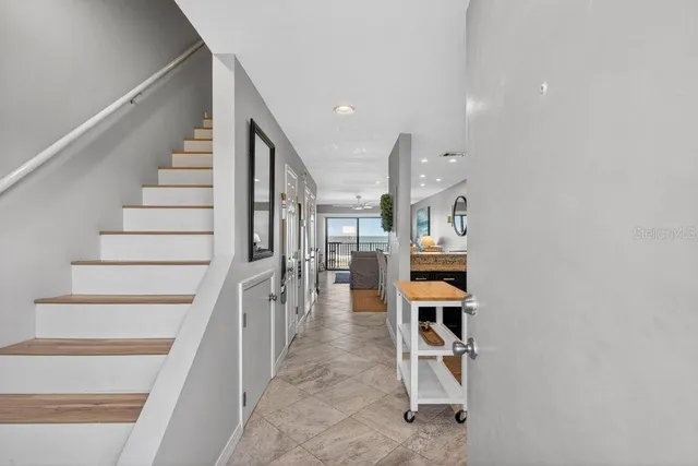 a hallway with cabinets