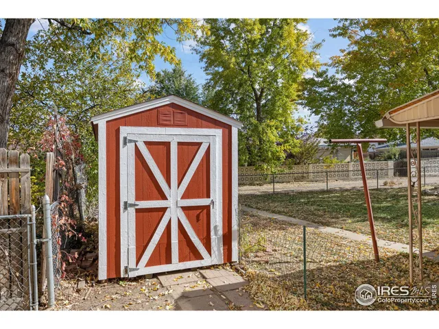 a house with trees in the background