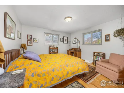 a bed room with a bed and a couch