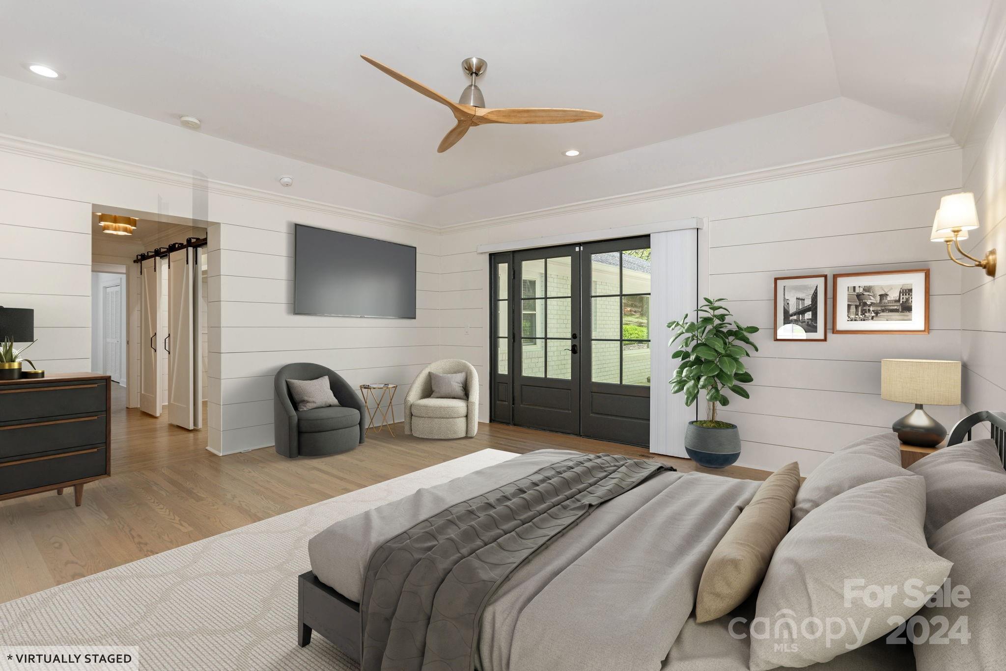 51 Forest Road Asheville, NC 28803 - Photo 22 of 45 a bedroom with a bed couch and a window