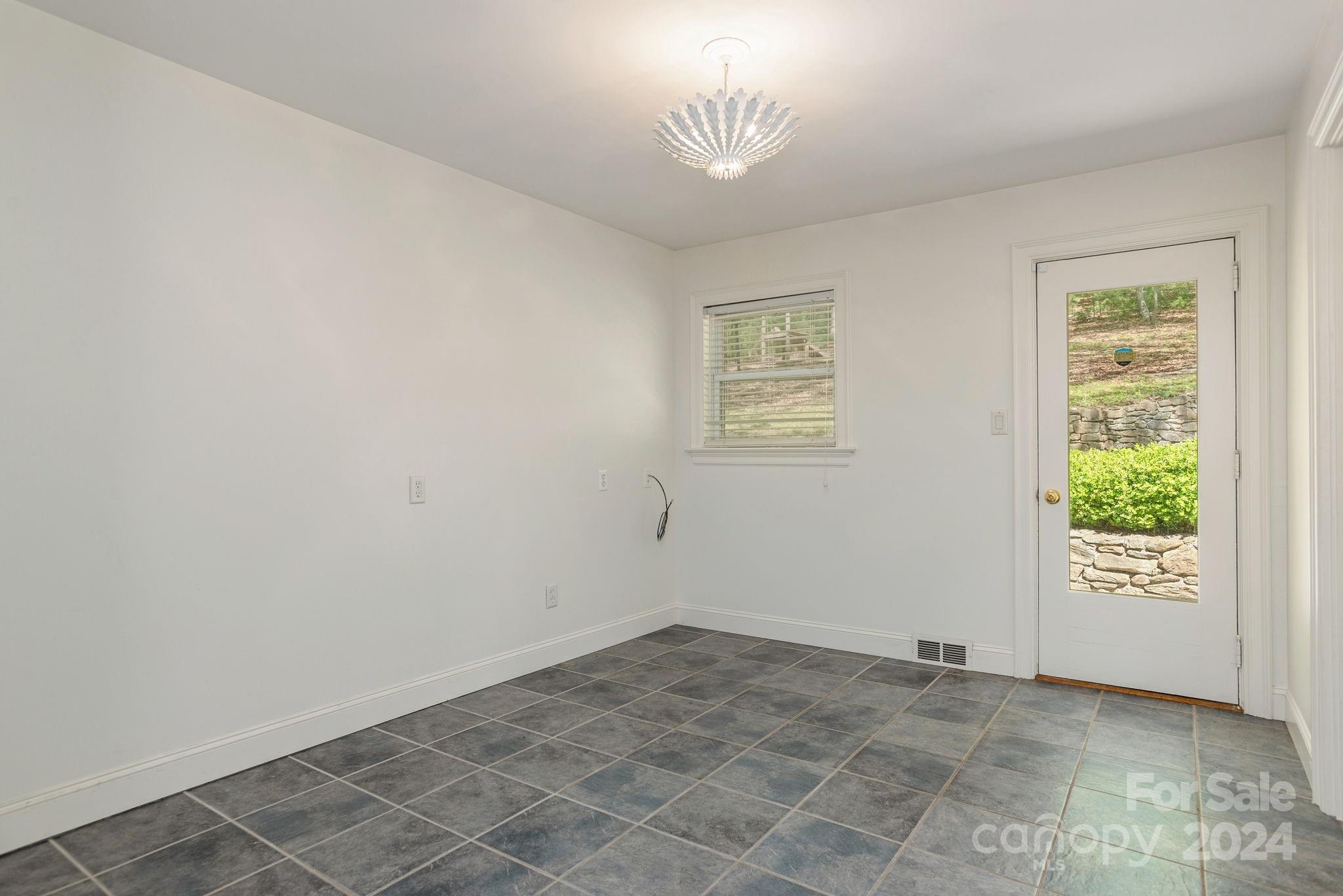 51 Forest Road Asheville, NC 28803 - Photo 34 of 45 an empty room with a window
