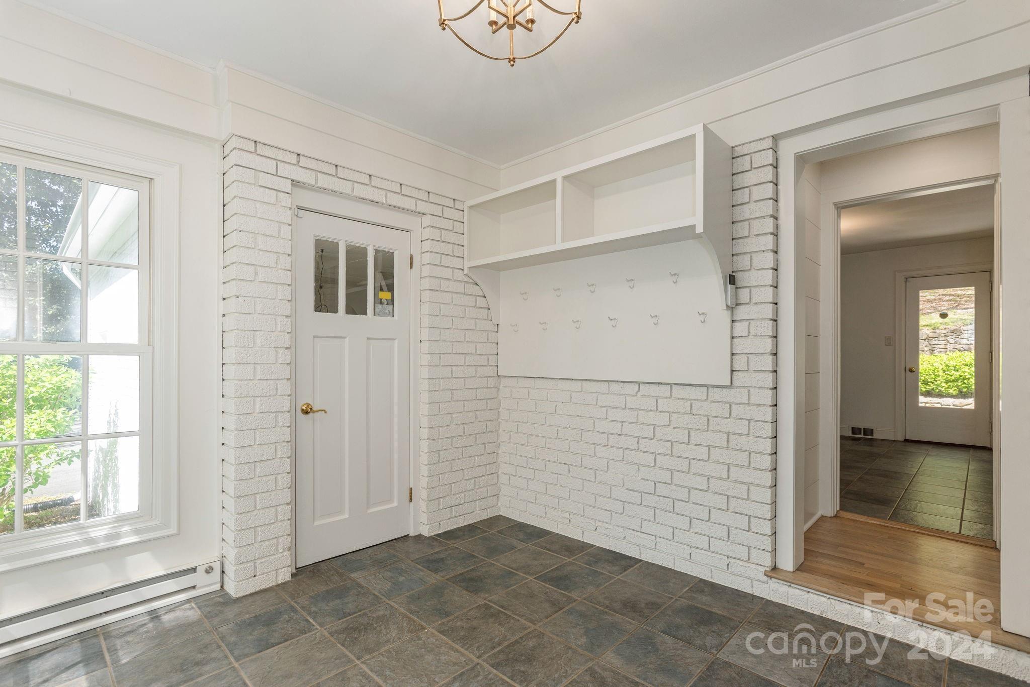 51 Forest Road Asheville, NC 28803 - Photo 35 of 45 an empty room with windows