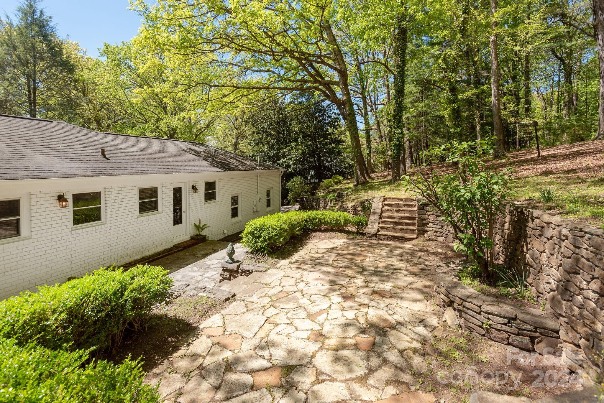51 Forest Road Asheville, NC 28803 - Photo 37 of 45 a view of a back yard of the house