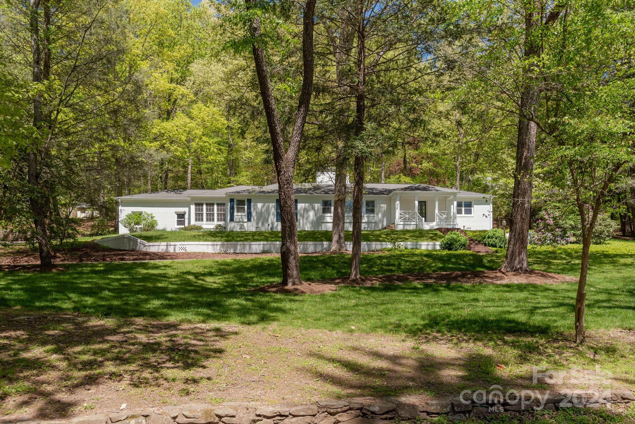 51 Forest Road Asheville, NC 28803 - Photo 43 of 45 a view of a house with a yard