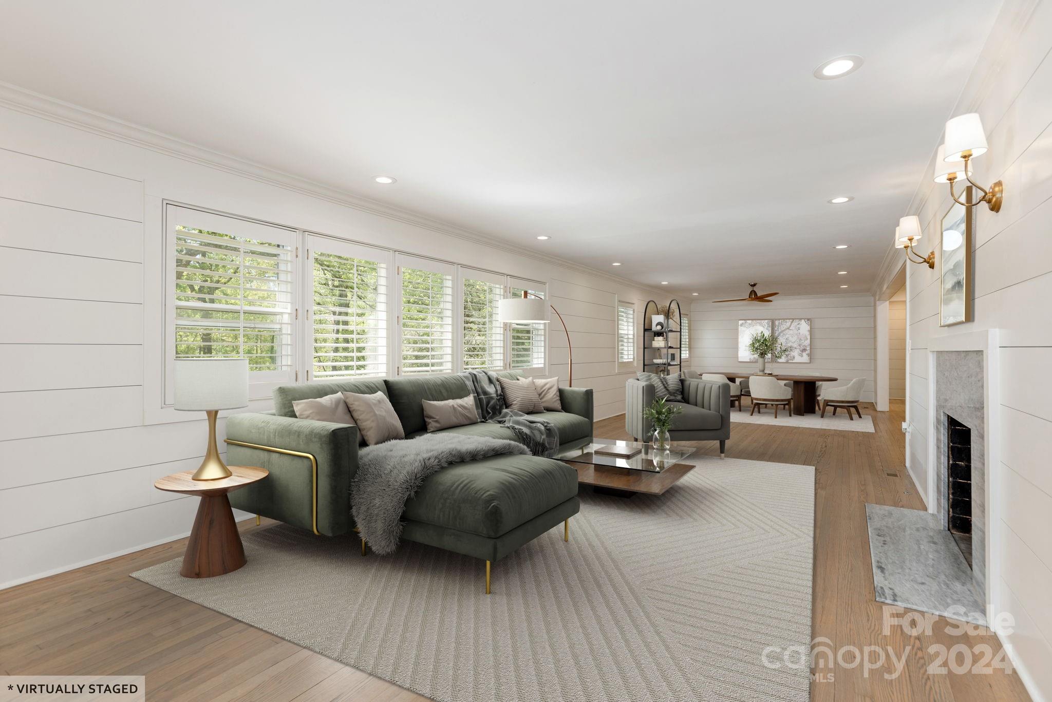 51 Forest Road Asheville, NC 28803 - Photo 6 of 45 a living room with furniture and a large window