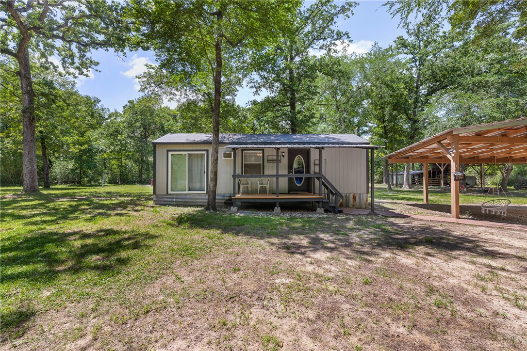 12255 County Road Centerville, TX 75833 - Photo 14 of 26 a view of a house with backyard