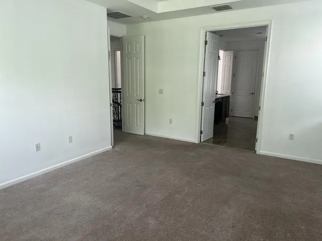 an empty room that has a bathroom