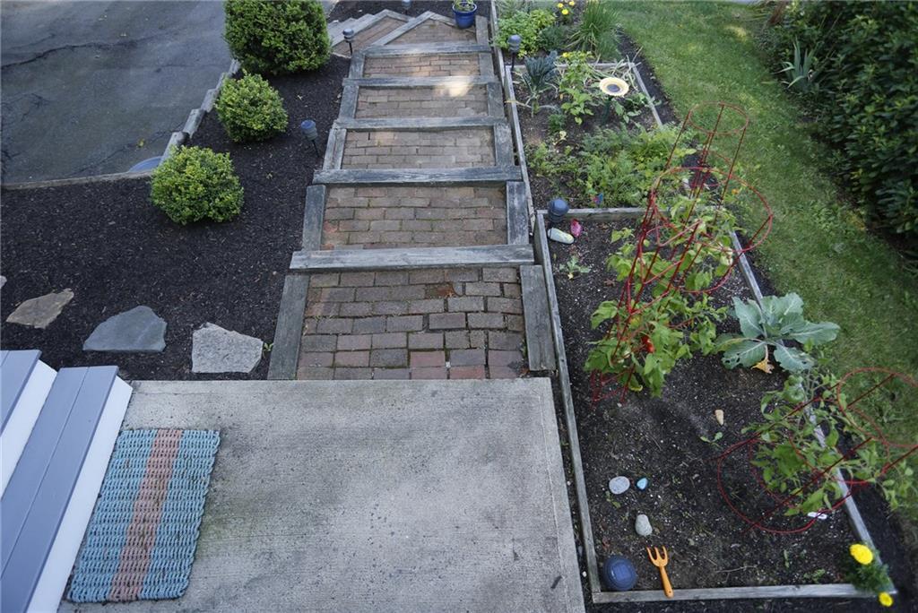 584 Shore Road Cape Elizabeth, ME 04107 - Photo 29 of 33 Walkway and vegetable & herb garden