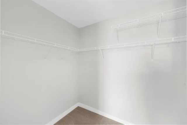 a empty closet with white paint