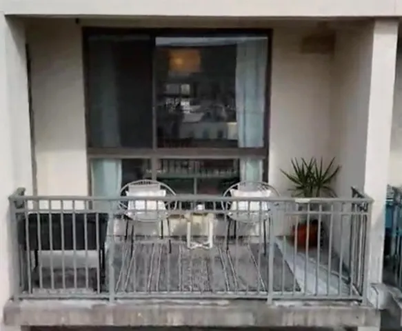 a view of kitchen with furniture and a potted plant