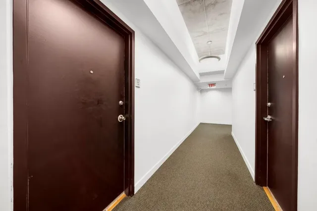 a view of hallway with stairs