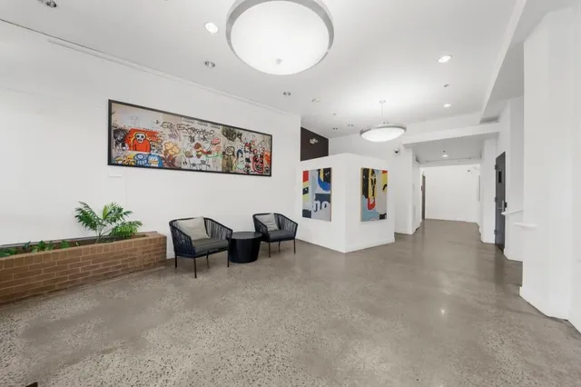 a view of a livingroom with furniture