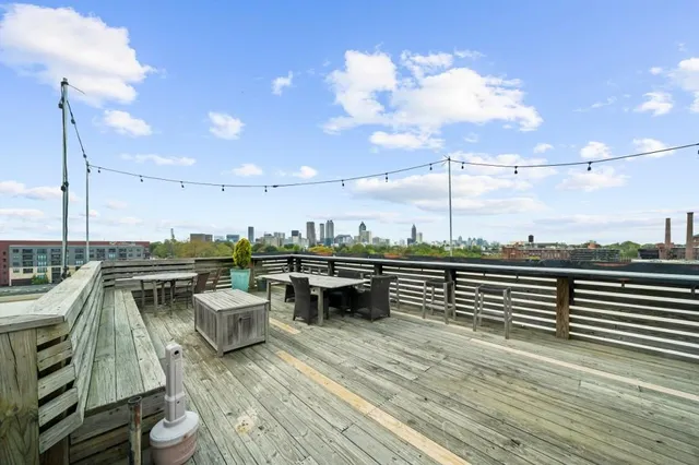 a view of a terrace with seating space and wooden floor