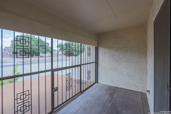 a view of a room with sliding glass door
