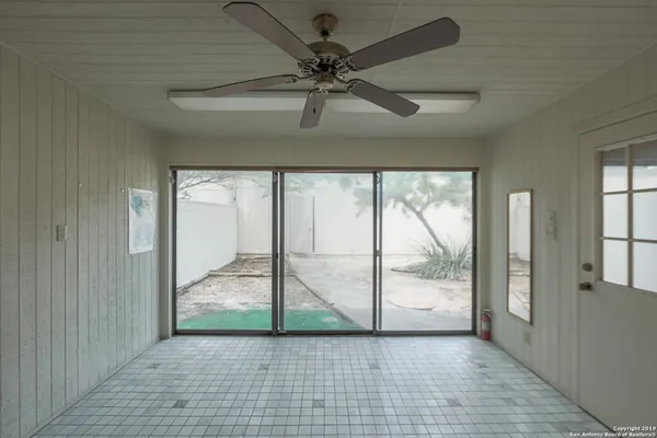 a house with a tree in front of it