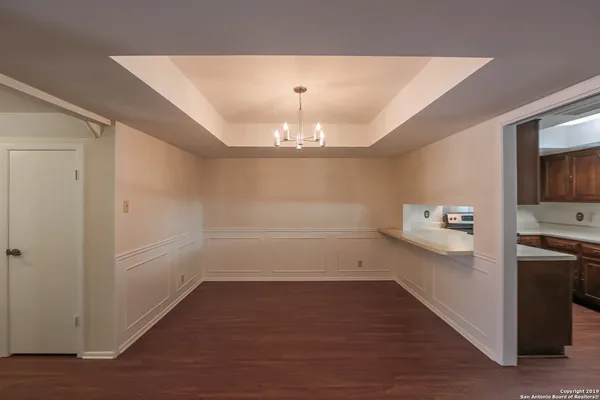 a kitchen with stainless steel appliances sink stove microwave and cabinets