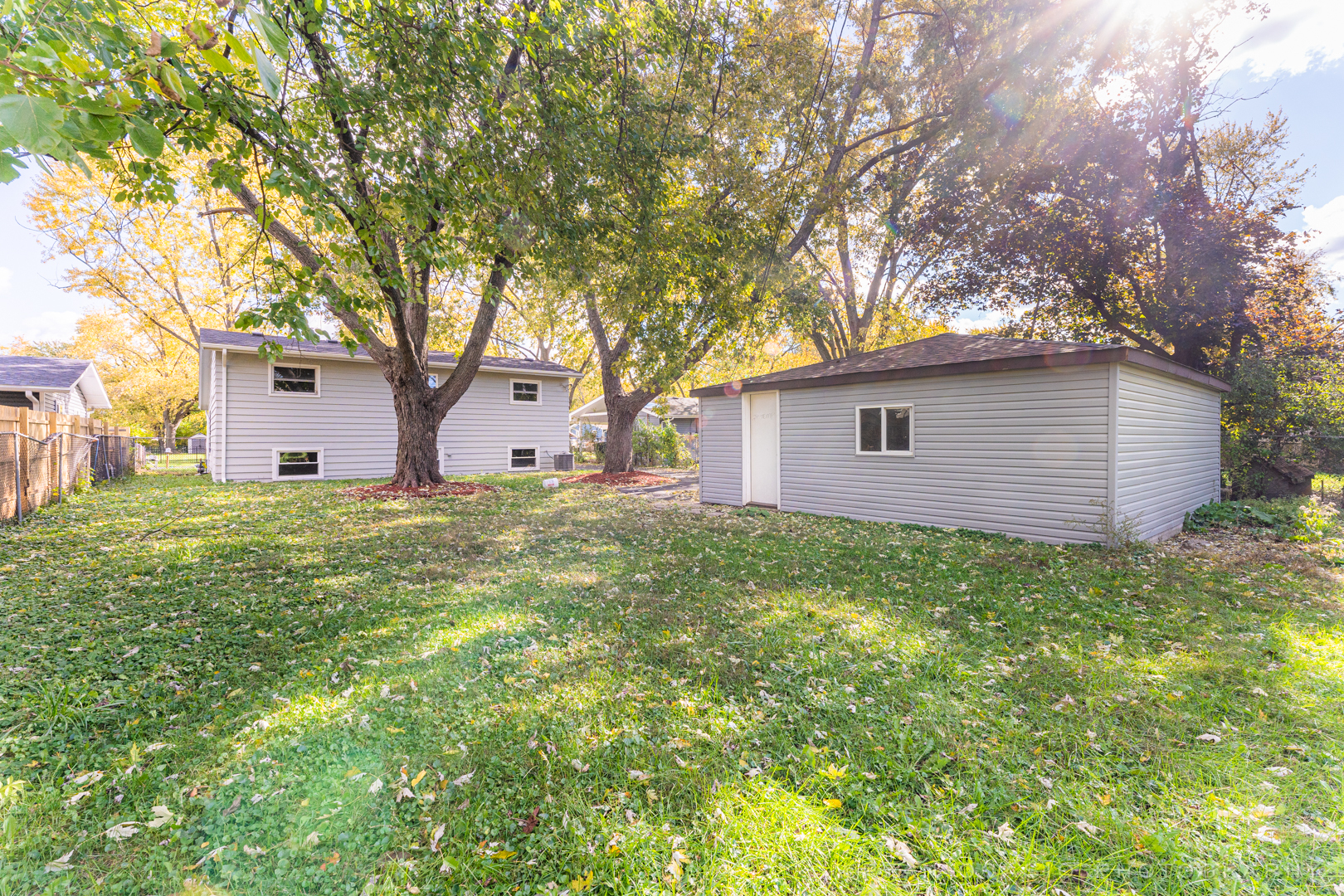 15318 Birch Road Markham, IL 60428 - Photo 23 of 26 a house view with a backyard space