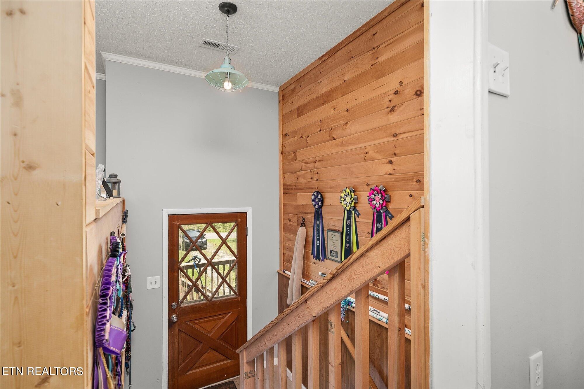 876 Shady Grove Road Lancing, TN 37770 - Photo 12 of 23 a view of a hallway with wooden floor and entryway