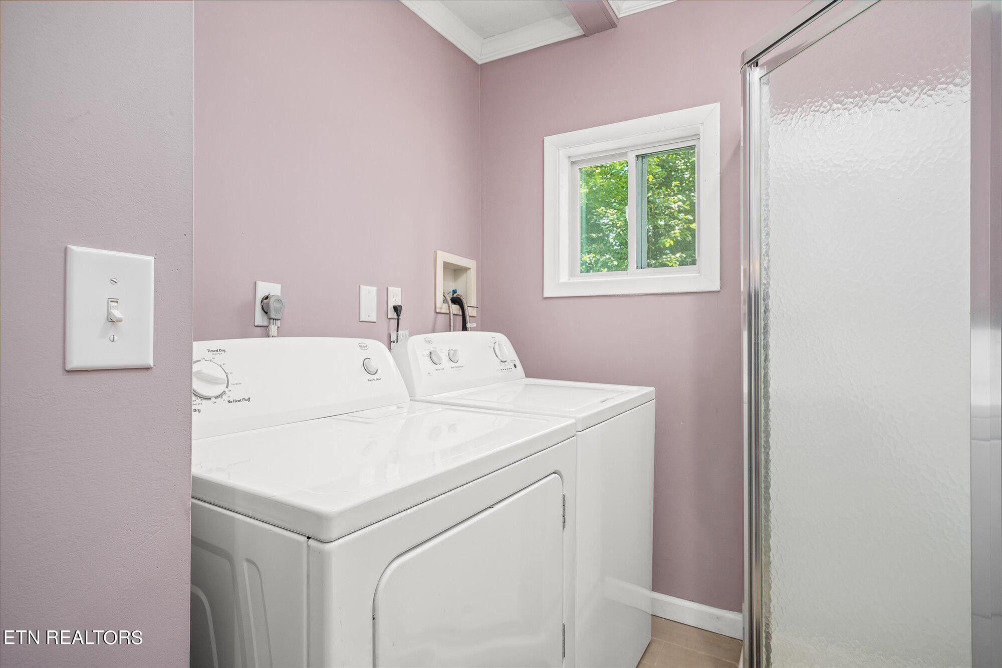 876 Shady Grove Road Lancing, TN 37770 - Photo 18 of 23 a utility room with dryer and washer