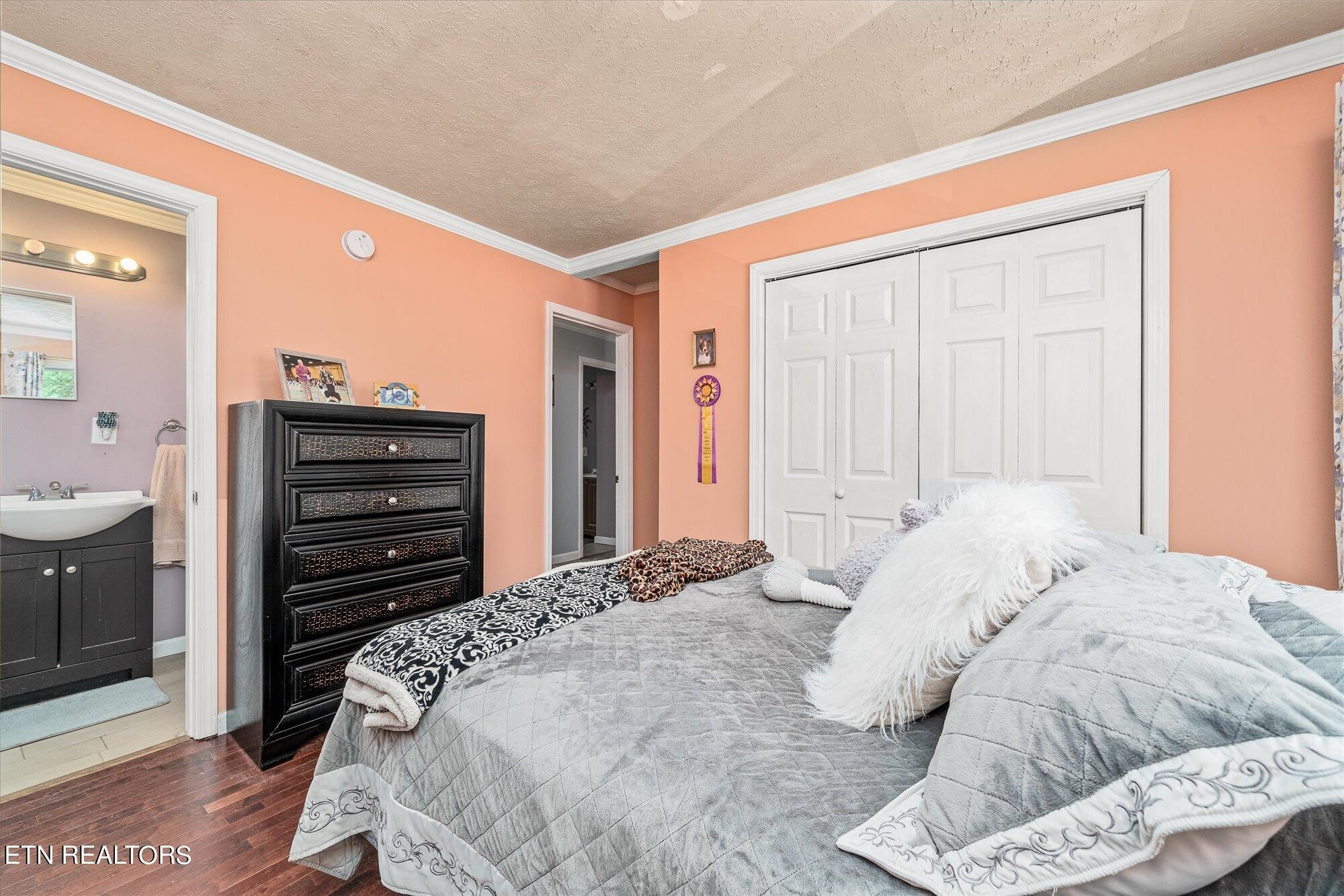 876 Shady Grove Road Lancing, TN 37770 - Photo 5 of 23 a bedroom with a bed and a dresser