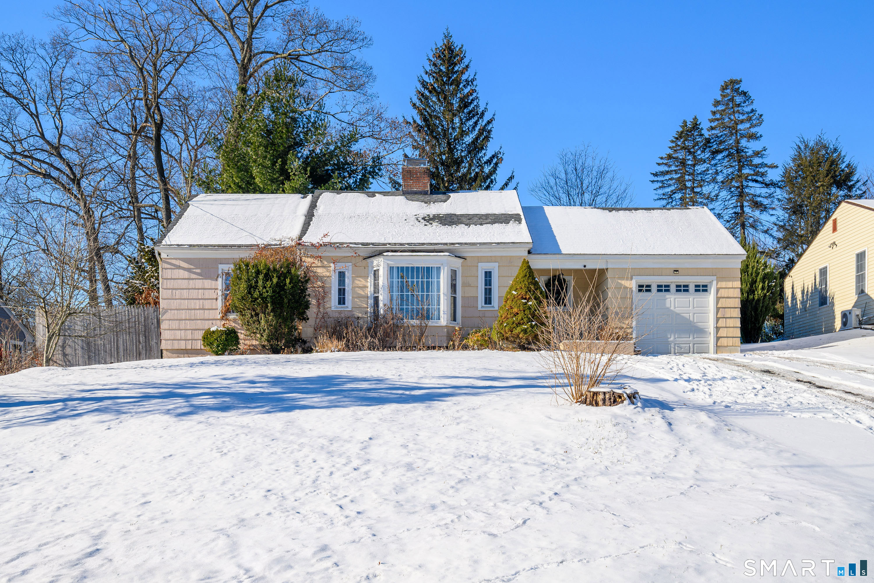 8 1st St Extension Danbury, CT 06810 - Photo 1 of 23 a view of a house with a patio and a yard