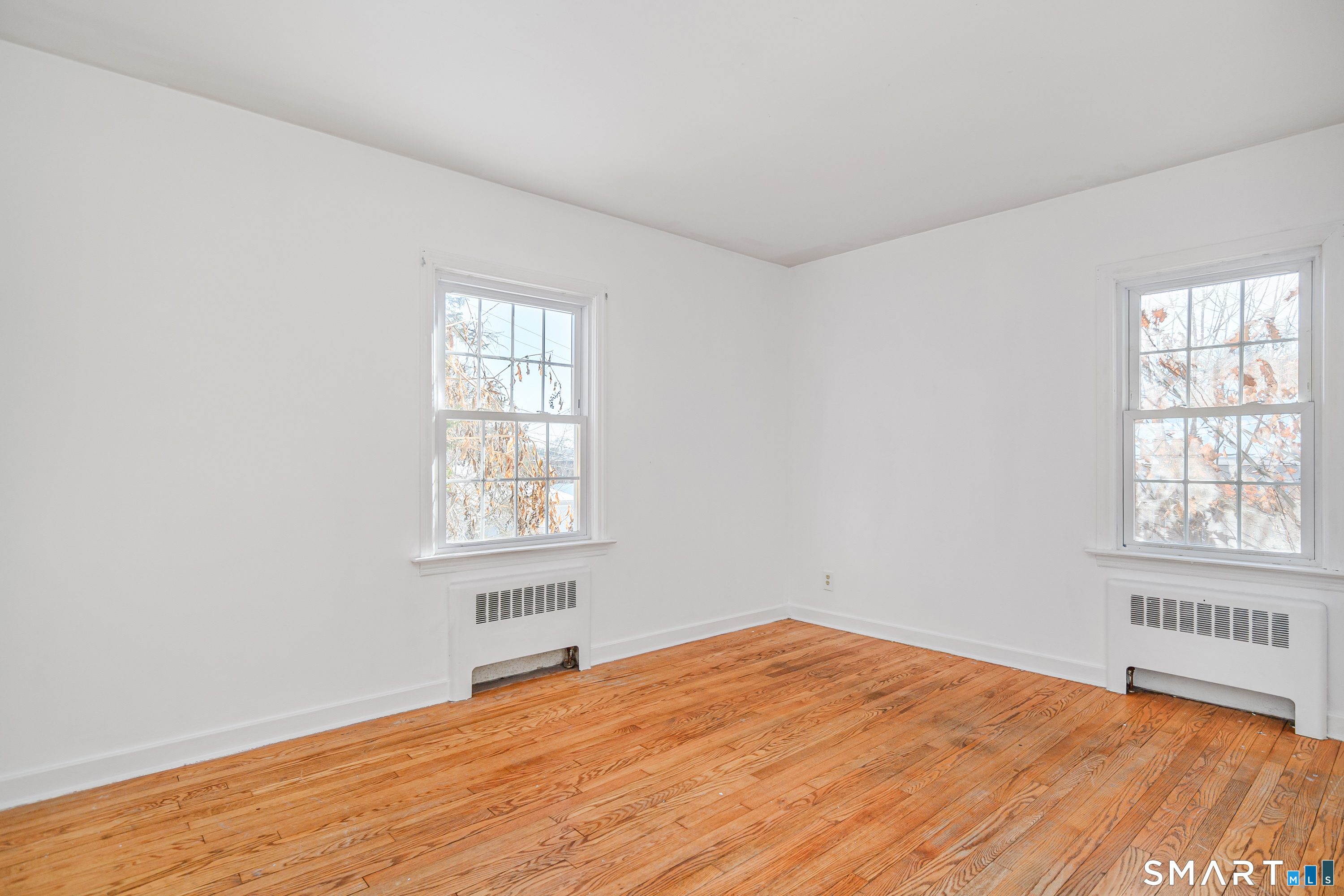 8 1st St Extension Danbury, CT 06810 - Photo 16 of 23 an empty room with a window