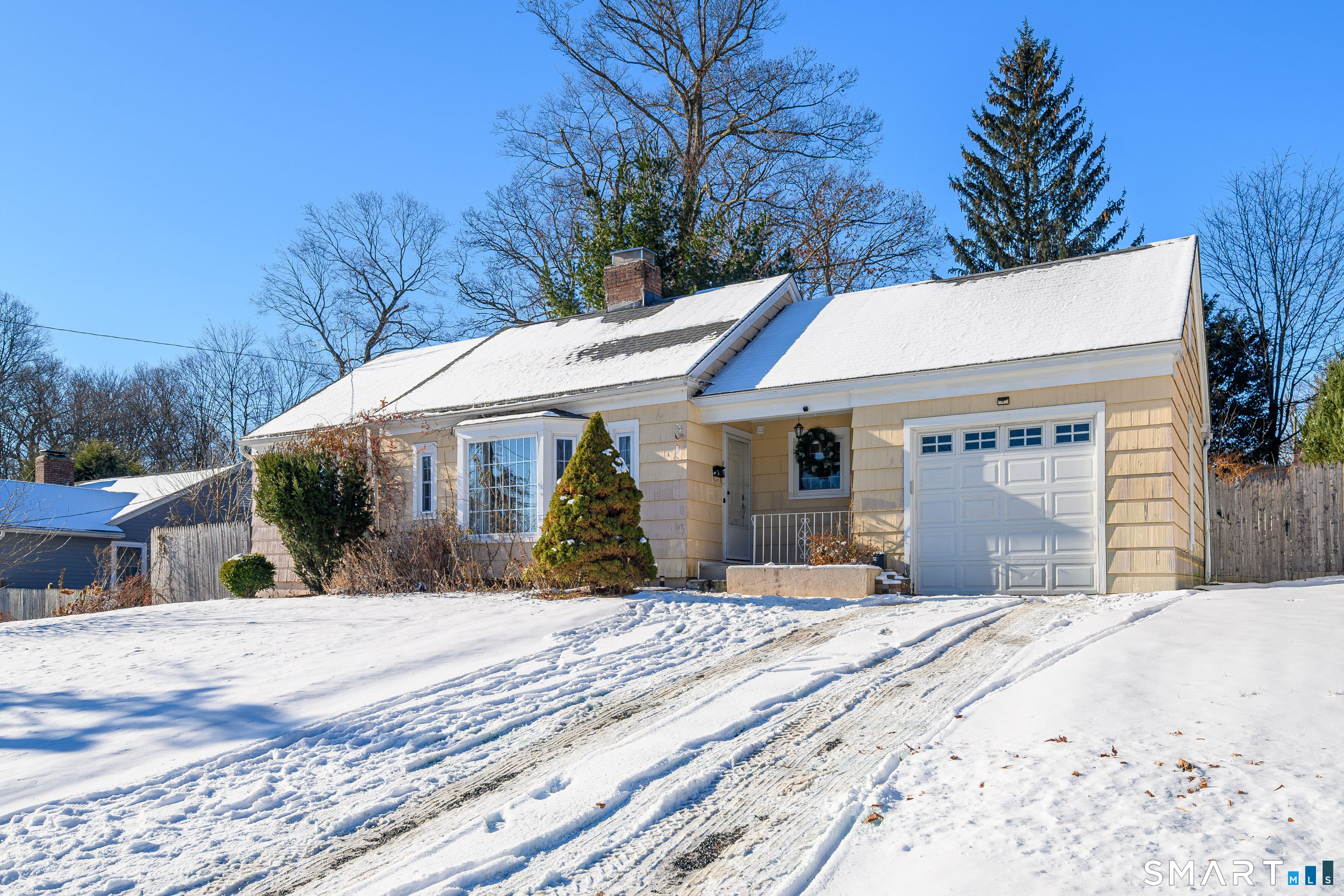 8 1st St Extension Danbury, CT 06810 - Photo 2 of 23 a view of a house with a patio