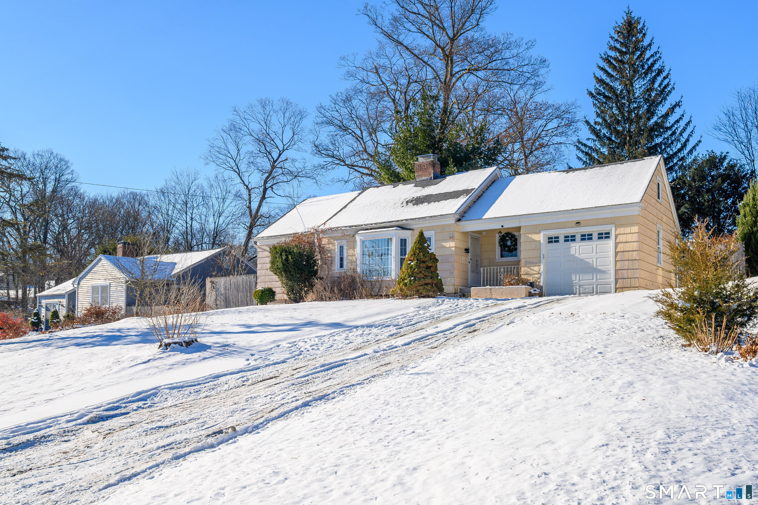 8 1st St Extension Danbury, CT 06810 - Photo 22 of 23 a view of a house with a patio