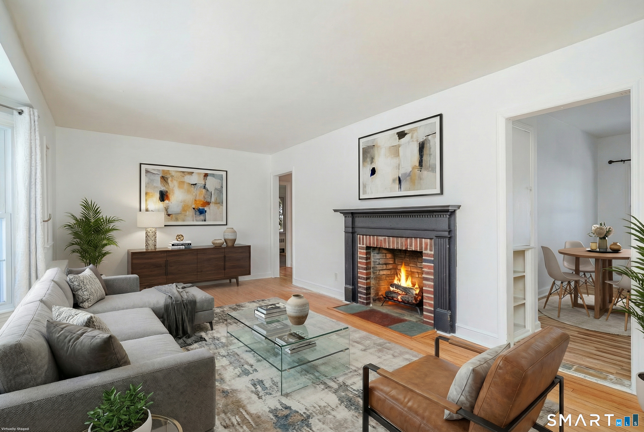 8 1st St Extension Danbury, CT 06810 - Photo 4 of 23 a living room with furniture and a fireplace