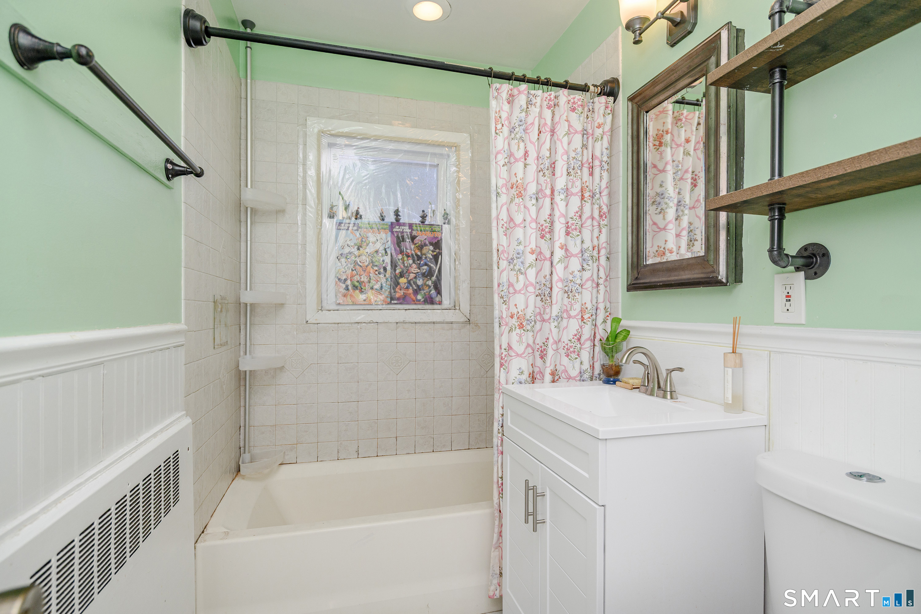 8 1st St Extension Danbury, CT 06810 - Photo 10 of 23 a bathroom with a sink and a bathtub