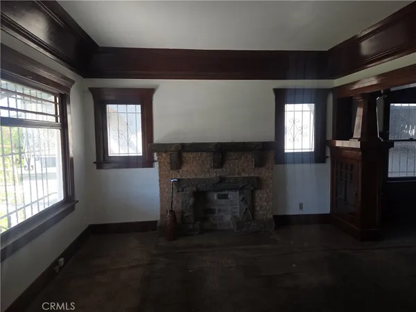 a living room with a fireplace