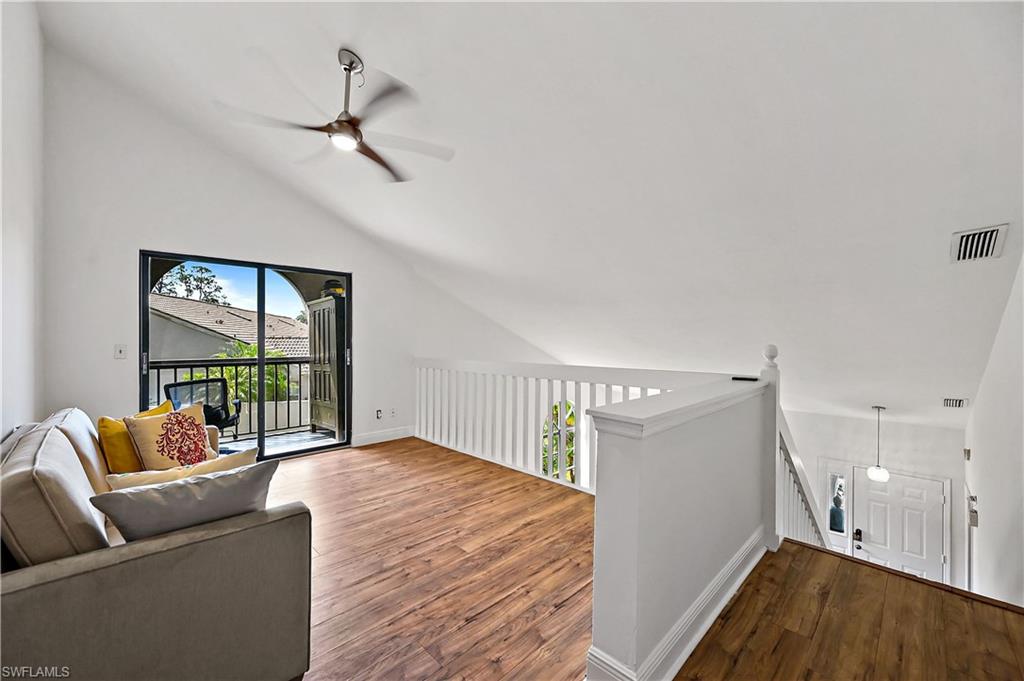 938 Augusta Boulevard, Unit D937 Naples, FL 34113 - Photo 9 of 27 a bedroom with furniture and a large window