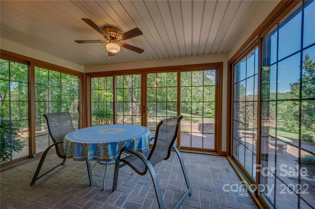 161 Walker Road Mill Spring, NC 28756 - Photo 10 of 47 a view of a dining room with furniture window and outside view