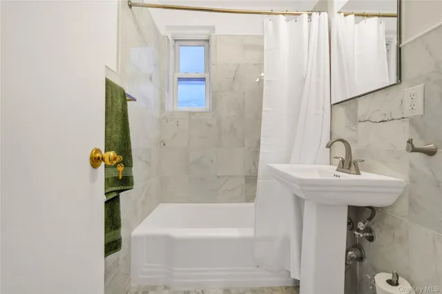 a bathroom with a sink and a bathtub