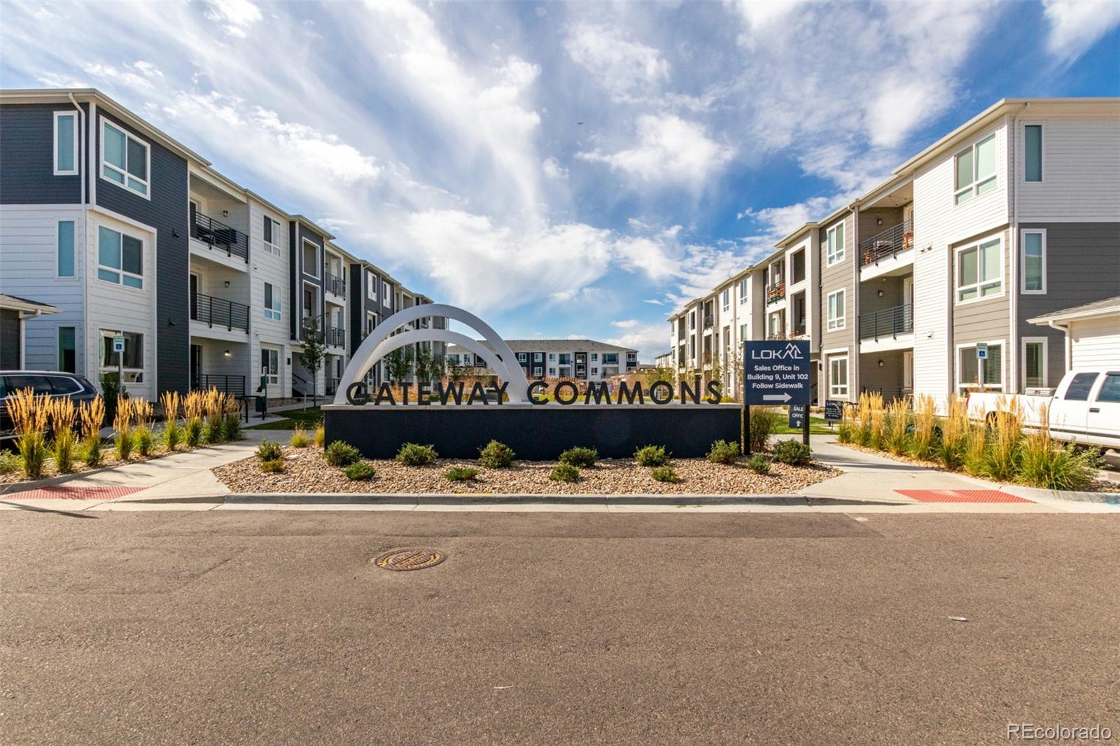 6153 North Ceylon Street, Unit 204 Denver, CO 80249 - Photo 21 of 22 a street view with building and street view