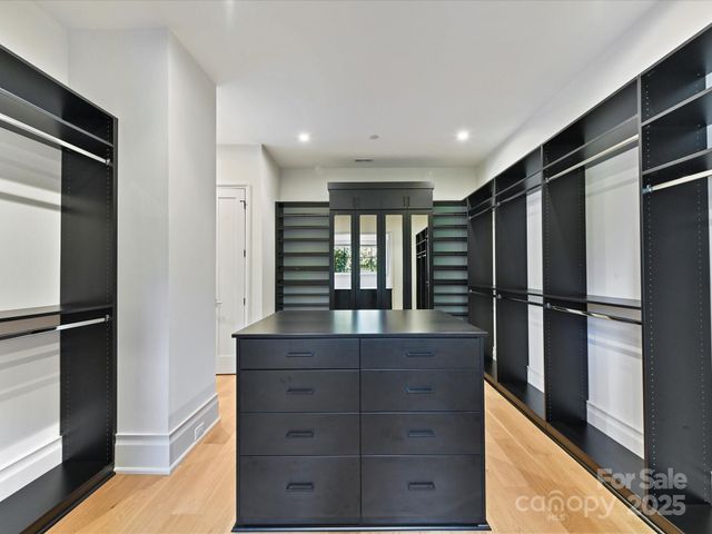 a kitchen with a refrigerator and countertop