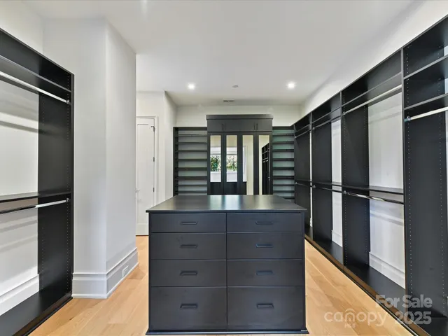 a kitchen with a refrigerator and countertop
