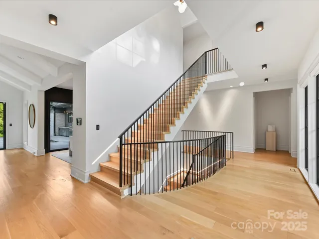 a view of a hallway with staircase