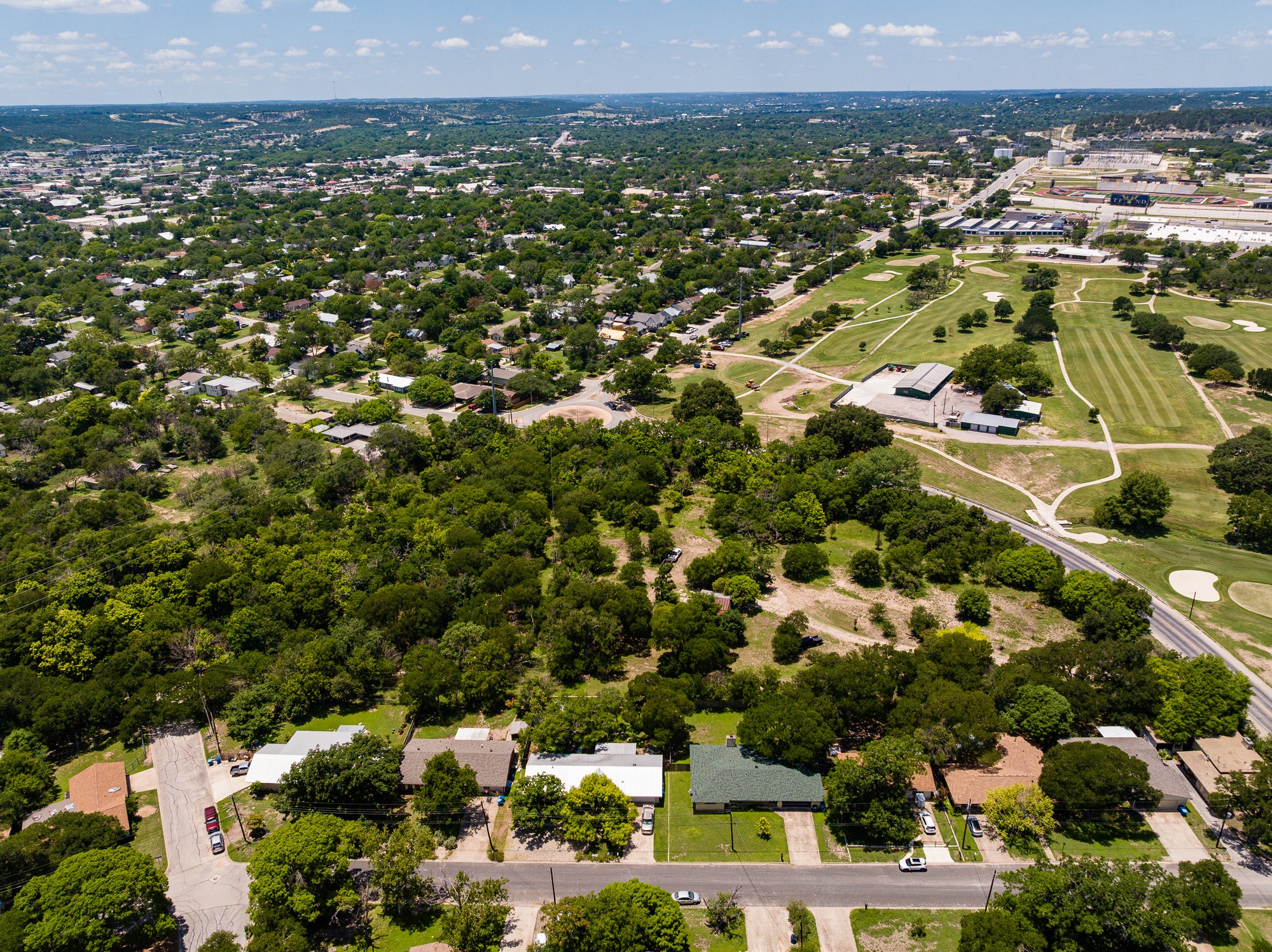 951 Cypress Creek Road Kerrville, TX 78028 - Photo 22 of 30 an aerial view of residential houses with city view