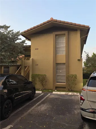 a car parked in front of a house
