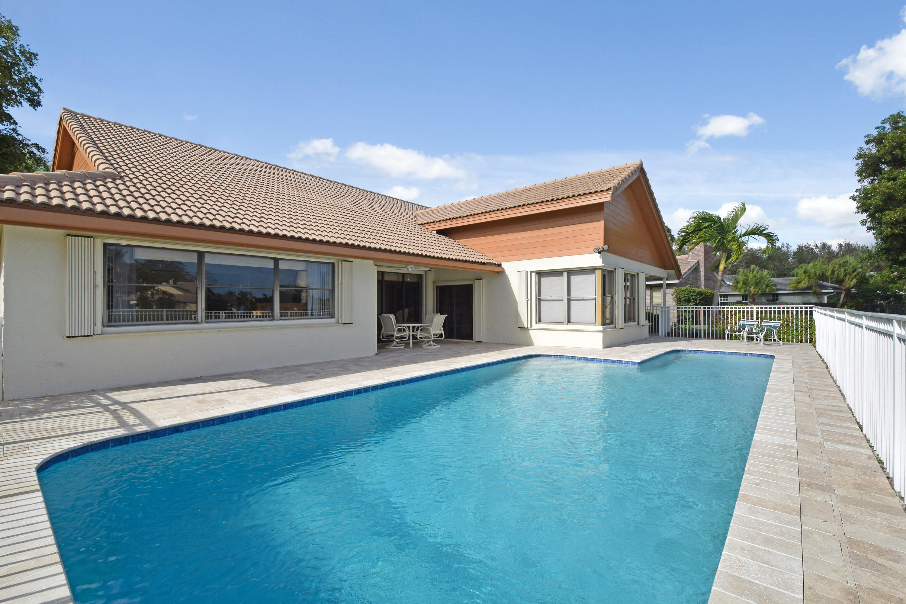 4006 Northwest 24th Terrace Boca Raton, FL 33431 - Photo 45 of 62 4006 back of house with pool
