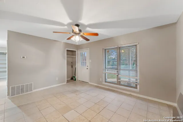 a view of an empty room with window